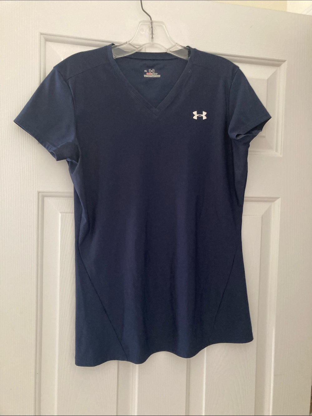 Woman’s Under Armor Navy heatgear shirt